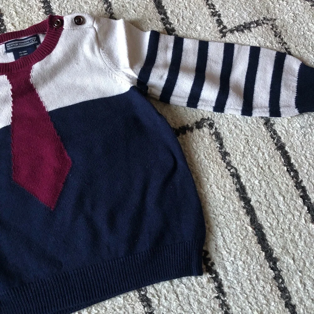 Newton Trading Co tie sweater